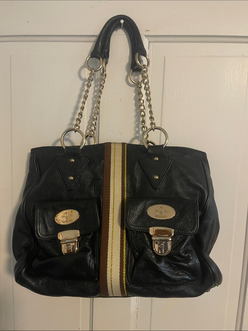 Black Leather Shoulder Bag with Gold Chain Handles and Center Stripe